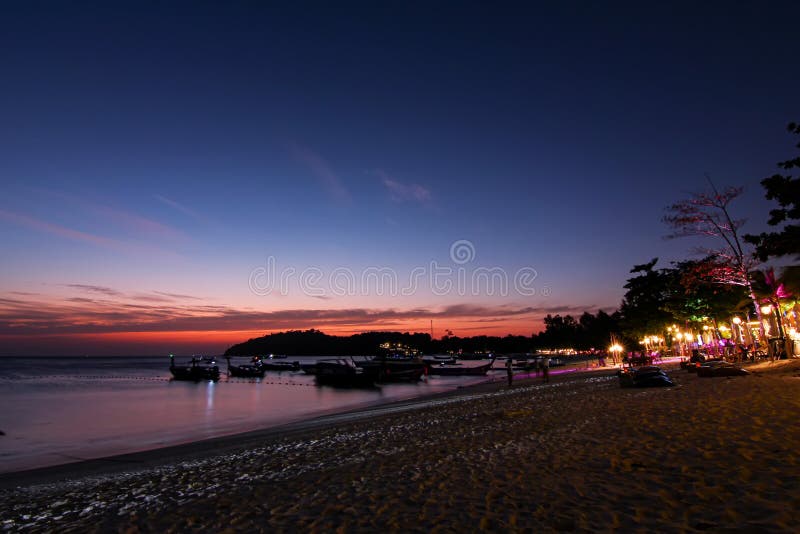 Beautiful Thailand travel island `Koh Lipe` peace sea sand beach with twilight evening sky background landscape and beach warm par