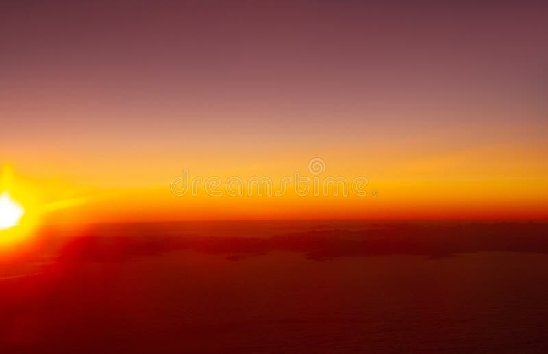 Beautiful thick clouds in the sky from the height of the flight of the airplane with a view of the sunset. Airplane height stock images, royalty-free photos and pictures