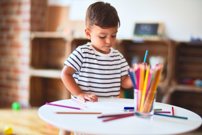Beautiful Toddler Boy Drawing Cute Draw Using Colored Pencils at ...