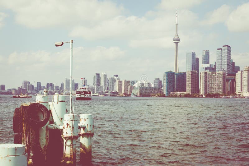Beautiful Toronto`s skyline over lake. Toronto, Ontario, Canada. stock photo Beautiful Toronto`s skyline over lake. Toronto, Ontario, Canada. stock photo