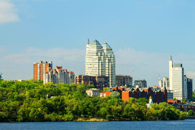 Beautiful towers, buildings and skyscrapers in the River in the early summer morning. Dnepropetrovsk, city Dnipro royalty free stock photography Beautiful towers, buildings and skyscrapers in the River in the early summer morning. Dnepropetrovsk, city Dnipro royalty free stock photography