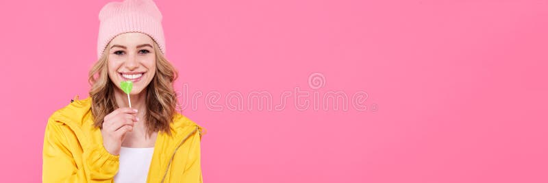 Beautiful trendy hipster teenage girl with lollipop. Attractive cool young woman fashion portrait. stock photos Beautiful trendy hipster teenage girl with lollipop. Attractive cool young woman fashion portrait. stock photos