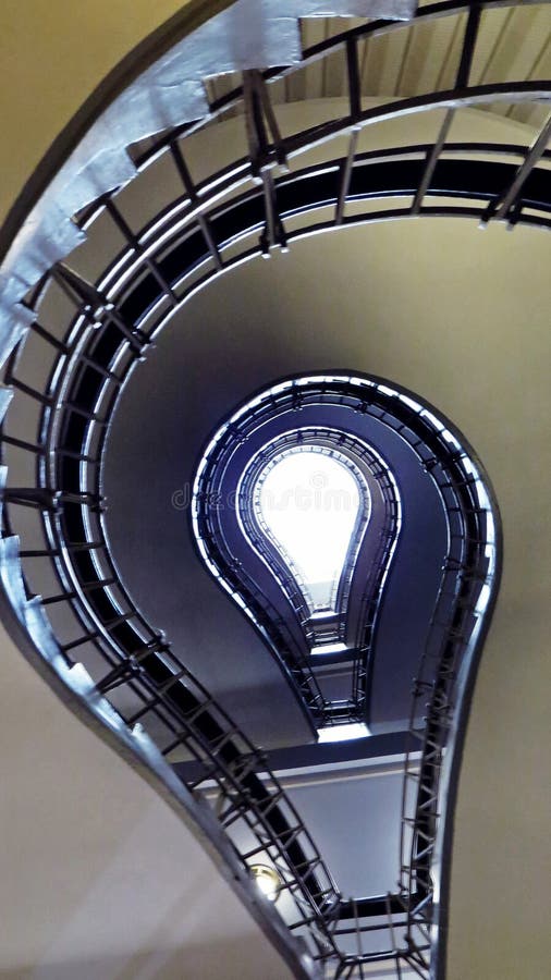 Beautiful Turning Staircase in the Old Historical Building stock photo Beautiful Turning Staircase in the Old Historical Building stock photo