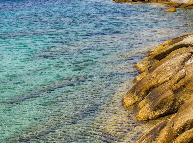 Beautiful Turquoise Sea Water and Rocky Shore Stock Photo - Image of ...