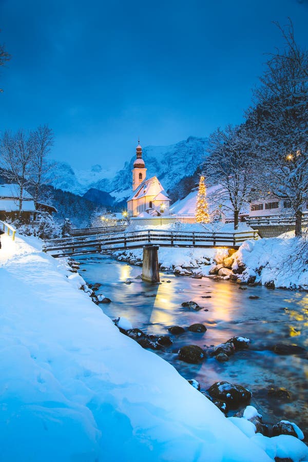 Church of Ramsau in winter twilight, Bavaria, Germany