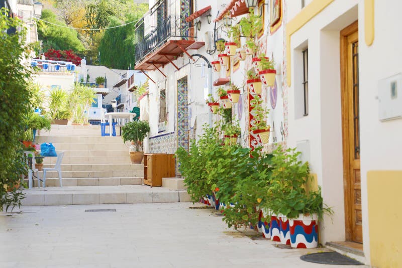 Beautiful typical alley of Barrio Santa Cruz in Alicante, Costa Blanca, Spain royalty free stock photos Beautiful typical alley of Barrio Santa Cruz in Alicante, Costa Blanca, Spain royalty free stock photos