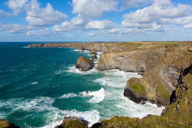 Beautiful UK coast Bedruthan Steps Cornwall England Cornish north coastline near Newquay on a beautiful sunny blue sky day