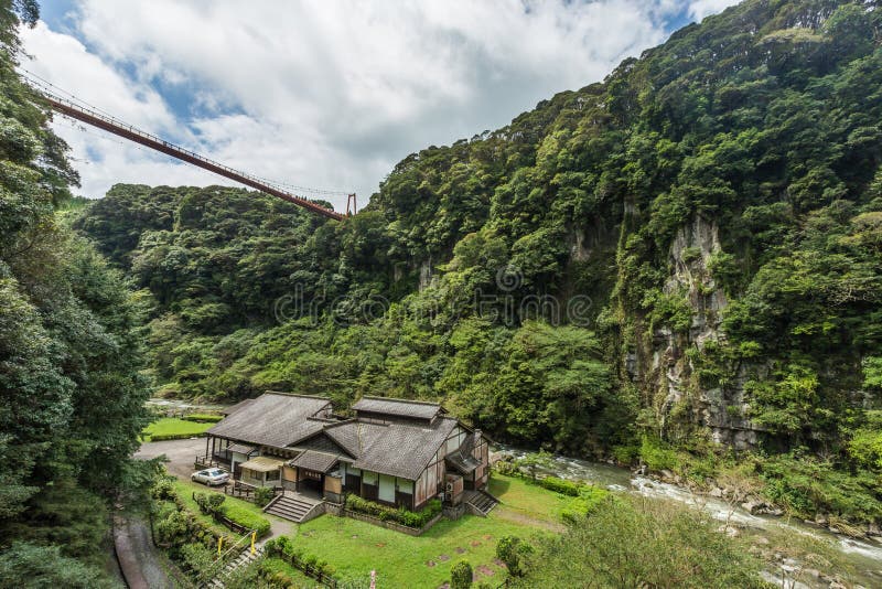 Beautiful valley and japanese house in Kamikawa Otaki Waterfall Park, Kagoshima