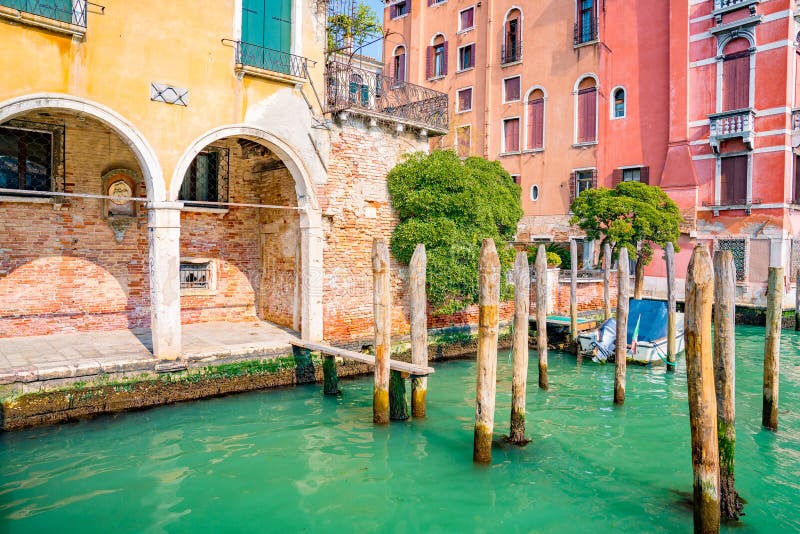 Beautiful Venice narrow canals, with many classic gondolas