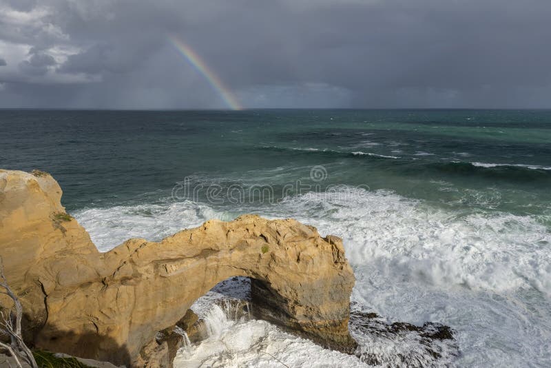 Beautiful View of the Arch Rock the Great Ocean Australia, with a Rainbow in Stock Image - Image of landscape, natural: 153004141