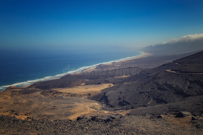 Beautiful view of the Cofete beach in Fuerteventura in the Canary Islands, Spain. It is longest beach of Europe. It is natural stock photo Beautiful view of the Cofete beach in Fuerteventura in the Canary Islands, Spain. It is longest beach of Europe. It is natural stock photo