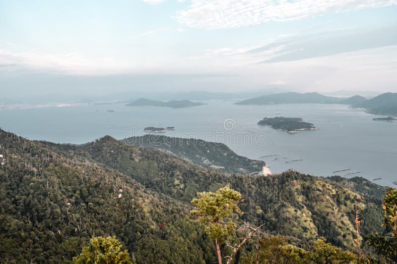https://thumbs.dreamstime.com/b/beautiful-view-forests-islands-cloudy-sky-pearl-farms-mount-misen-miyajima-island-hiroshima-japan-beautiful-view-138290120.jpg
