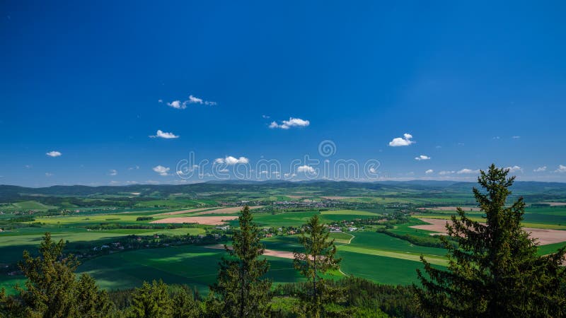 Beautiful view over green colorful valley with fields, Czech Republic stock photos
