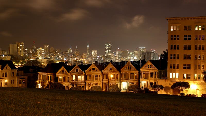 Beautiful view of Painted Ladies, colorful Victorian houses in a row in the evening in San Francisco / California, USA stock photo Beautiful view of Painted Ladies, colorful Victorian houses in a row in the evening in San Francisco / California, USA stock photo