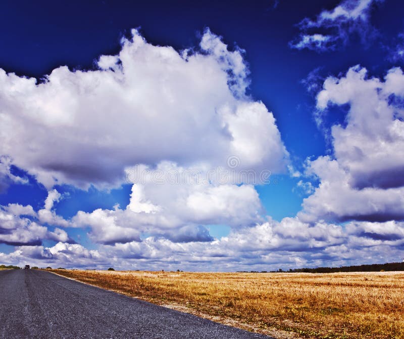 Beautiful view on road and field with beauty cloudy sky instagr royalty free stock photos Beautiful view on road and field with beauty cloudy sky instagr royalty free stock photos