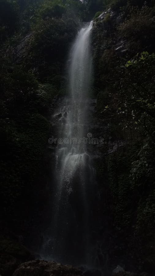 Beautiful view of the waterfall with very clear water. Fountain waterfall clear stock images, royalty-free photos and pictures