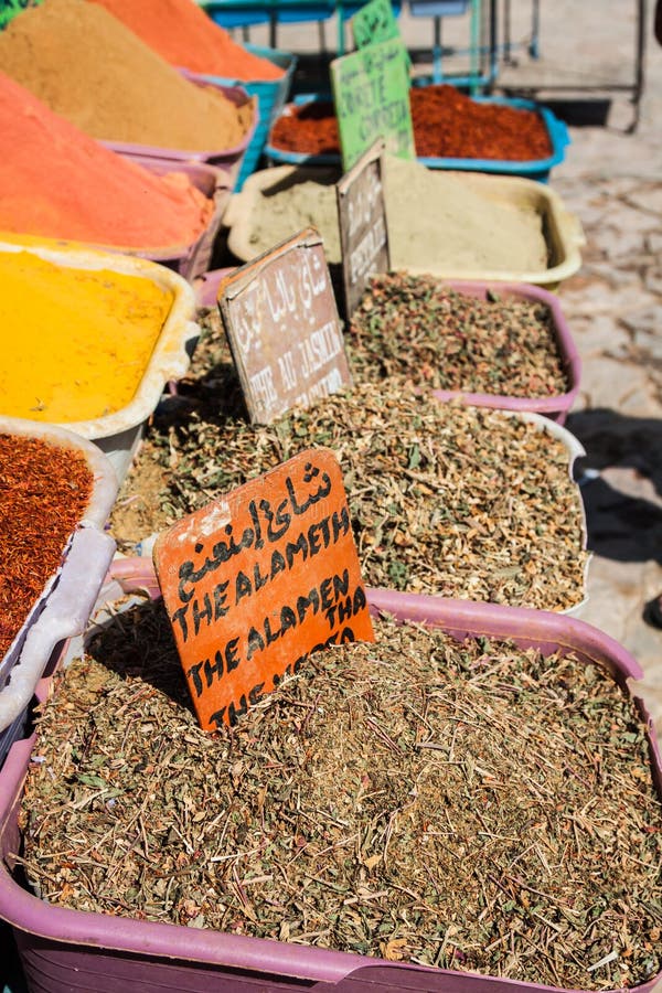 Beautiful vivid oriental market with baskets full of various spi. Herb, arabic.