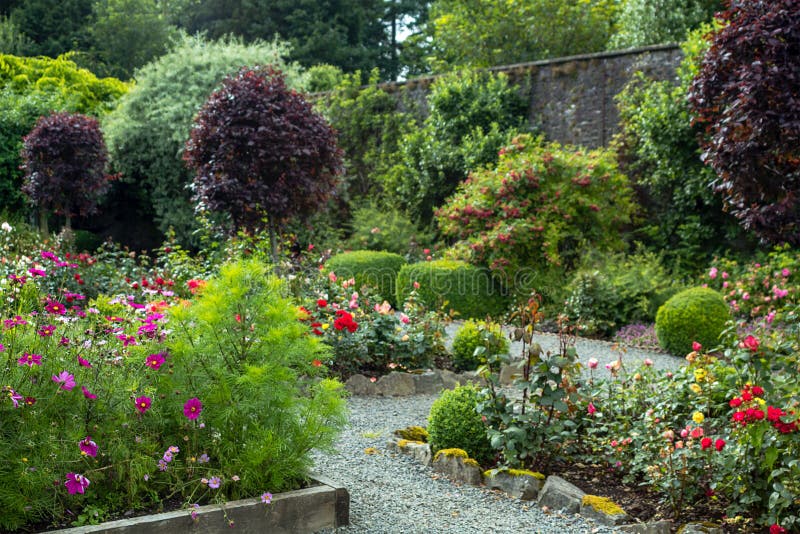 Beautiful Walled, Victorian Garden with Variety of Flowers and Trees