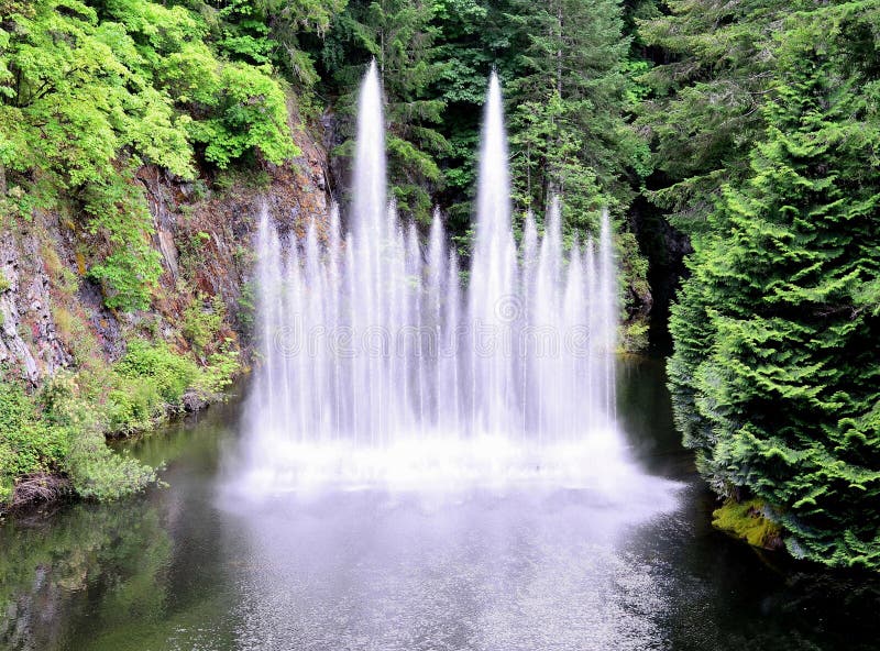 Beautiful water fountain stock image. Image of nature 32412711