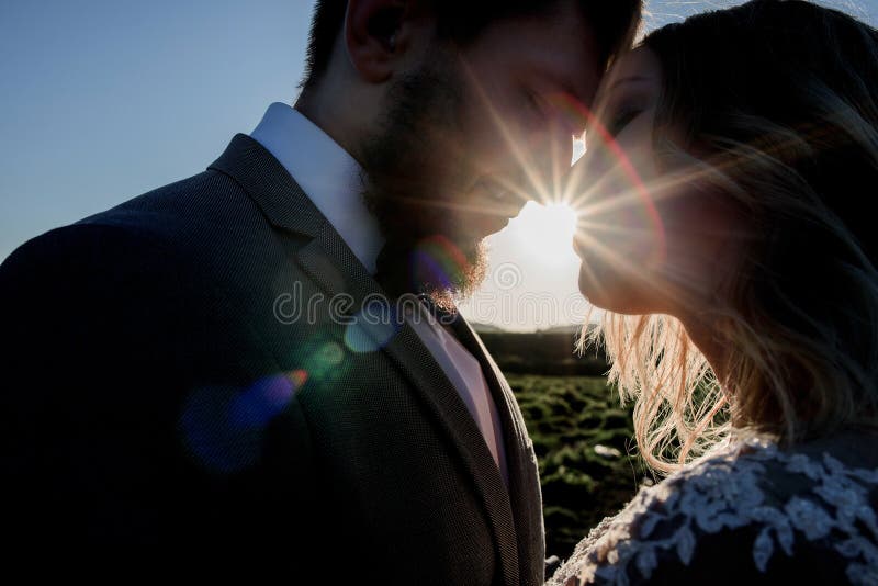 beautiful wedding couple poses green field rays sunset beautiful wedding couple poses green field rays 209811179