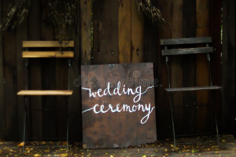 Beautiful wedding text sign. rustic wedding concept. pointing for wedding ceremony location. creative ideas - Image background royalty free stock photo Beautiful wedding text sign. rustic wedding concept. pointing for wedding ceremony location. creative ideas - Image background royalty free stock photo