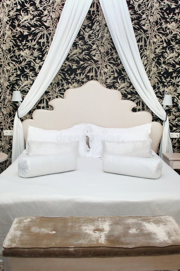 Beautiful White Bed with a Bedside Ottoman Stock Image Image of