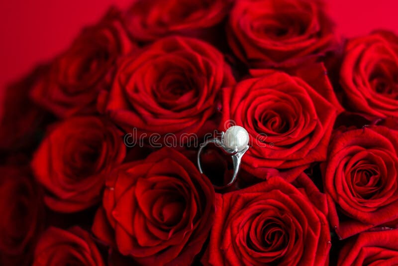 Beautiful White Gold Pearl Ring and Bouquet of Red Roses, Luxury ...