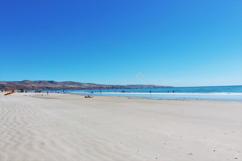 Beautiful white sandy beach with clear blue sky stock image Beautiful white sandy beach with clear blue sky stock image