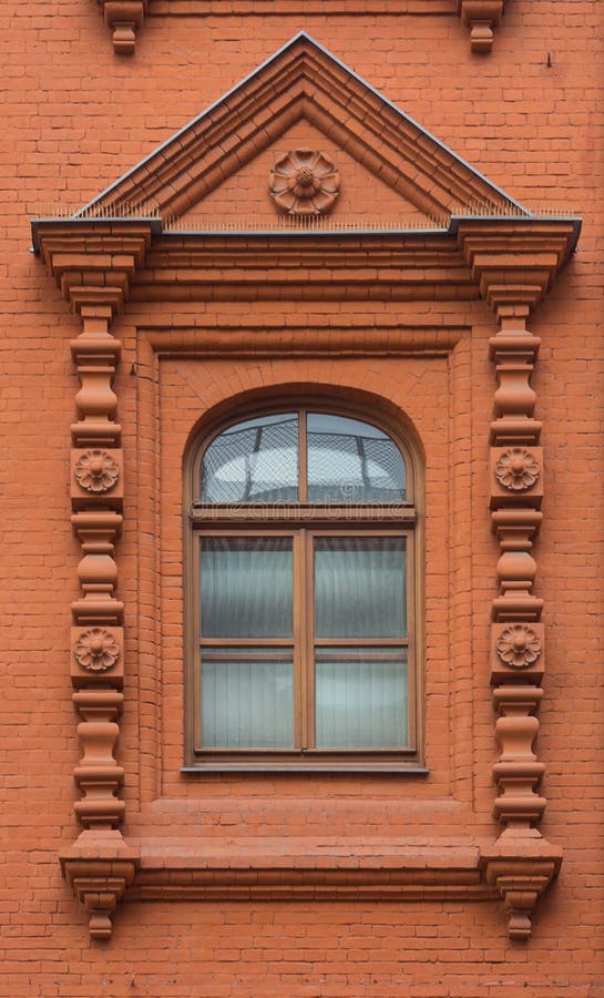 Beautiful Decorative Finishing of the Brick Window Trim Stock Photo