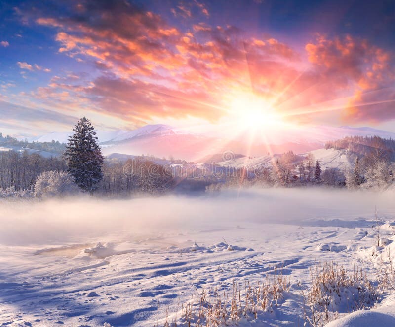 Beautiful winter sunrise in mountain village. stock photo Beautiful winter sunrise in mountain village. stock photo