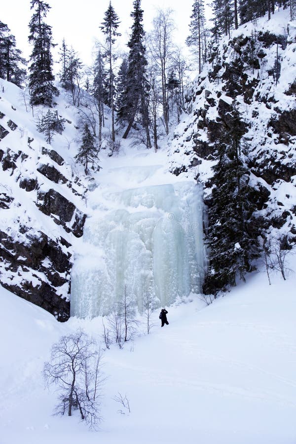 Winter wonderland with frozen waterfall, Finland