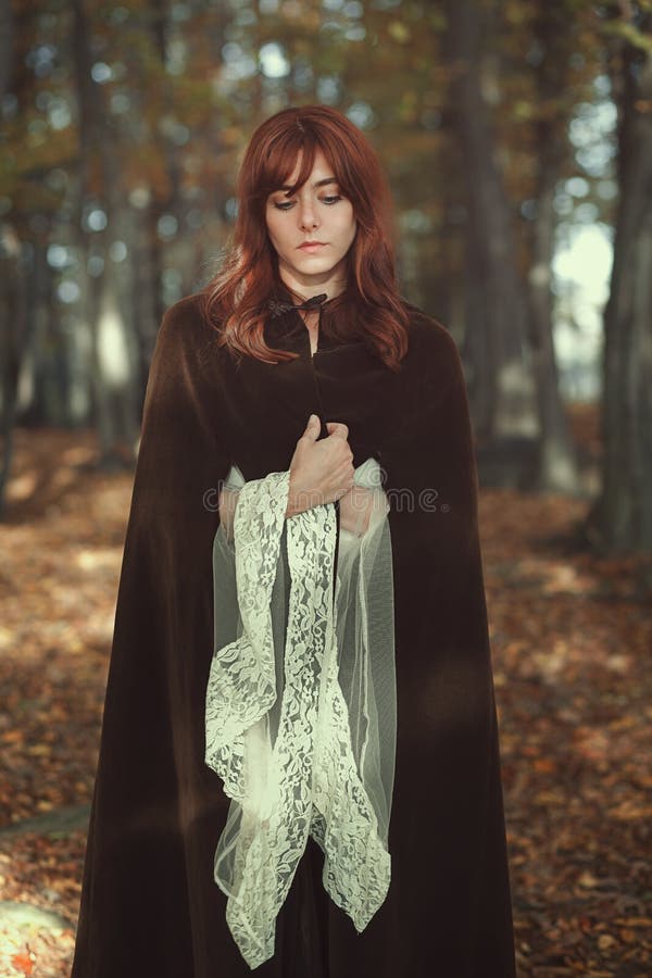 Beautiful woman alone in the forest