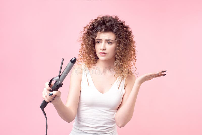 Beautiful Woman with Amazing Curls in White Shirt Holds Styling Accessories in Hand. Hair Styling Set with Curling Stock Photo - Image of beauty, hair: 145672348 Beautiful Woman with Amazing Curls in White Shirt Holds Styling Accessories in Hand. Hair Styling Set with Curling Stock Photo - Image of beauty, hair: 145672348