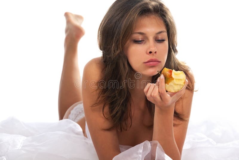 Beautiful woman with an apple