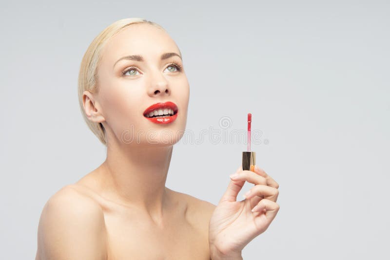 Beautiful Woman Applying Lip Gloss Stock Image Image Of Modern