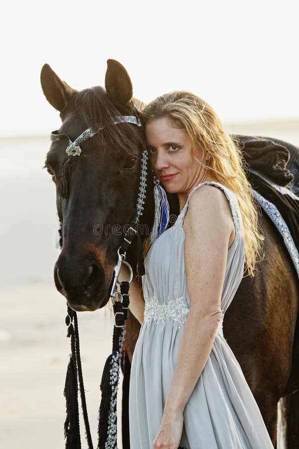 Beautiful woman and arabian horse stock photography Beautiful woman and arabian horse stock photography