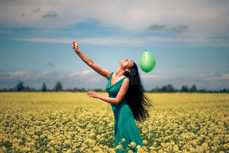 Beautiful woman with balloon