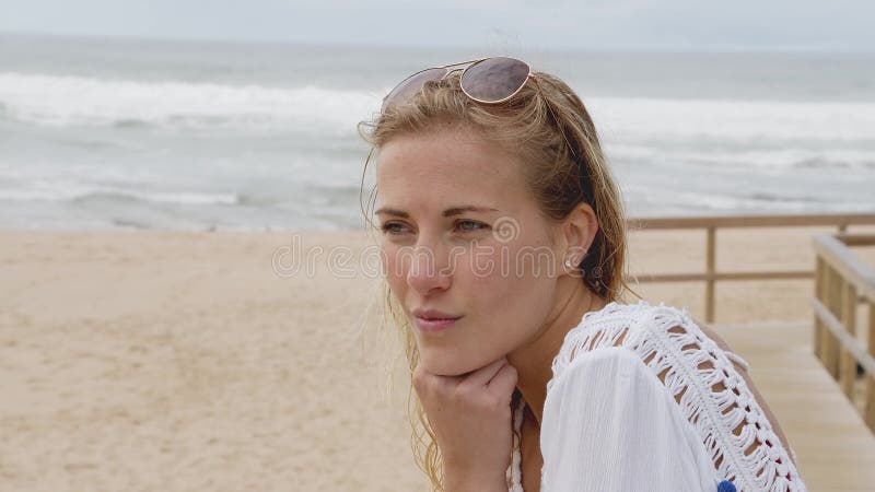 Beautiful Woman in a Bikini Laying on the Sandy Beach of Miami at ...