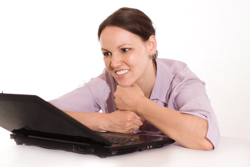 Beautiful woman behind laptop