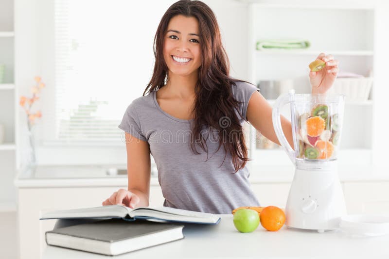 Beautiful woman consulting a notebook stock photos