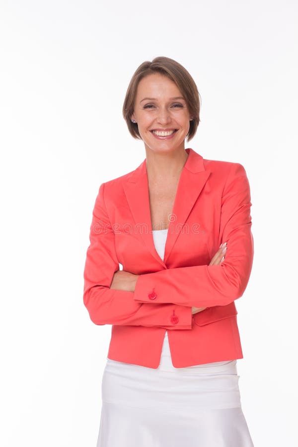 Beautiful woman in coral jacket on white