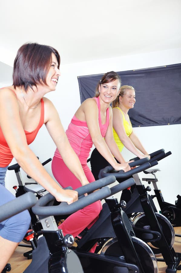 Beautiful Woman Doing Exercise in a Spinning Class Stock Image - Image ...