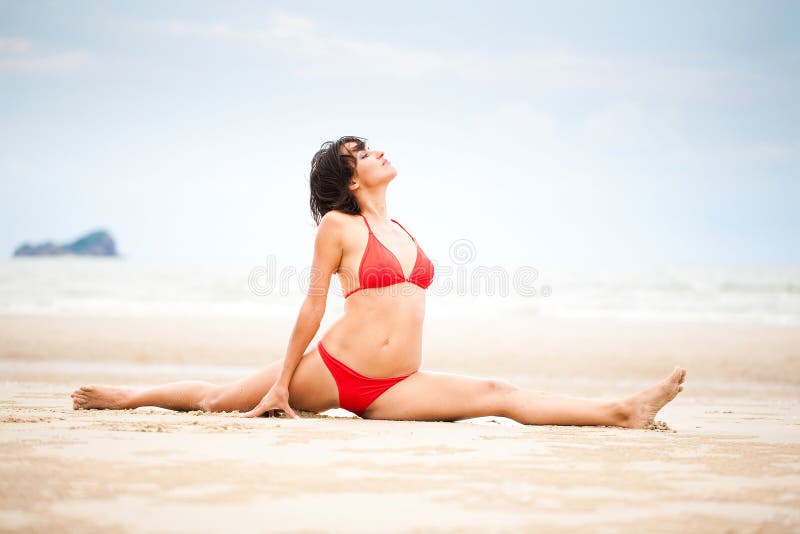 Beautiful woman doing stretches exercise