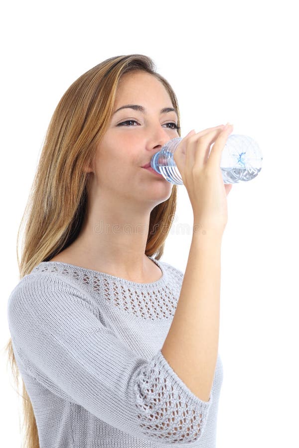 Beautiful woman drinking water from a bottle isolated royalty free stock photo Beautiful woman drinking water from a bottle isolated royalty free stock photo