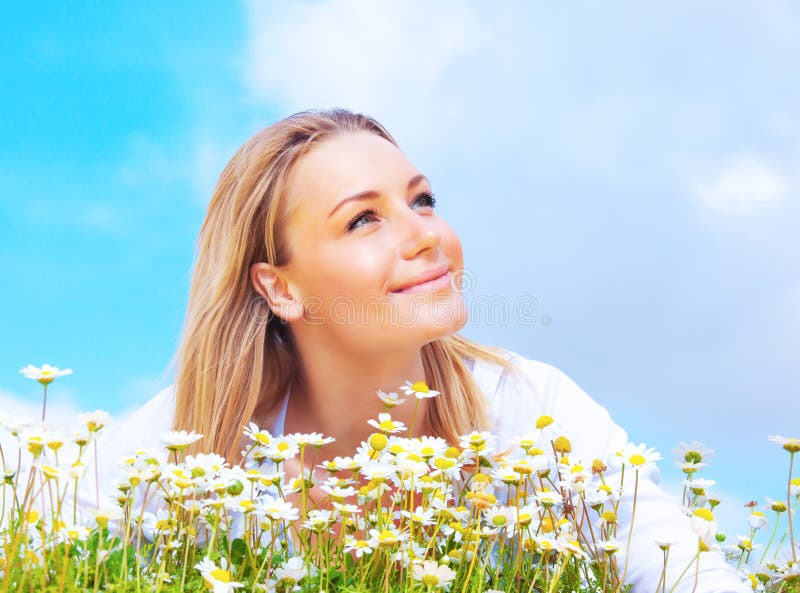 Happy girl enjoying daisy flower field stock photos Happy girl enjoying daisy flower field stock photos