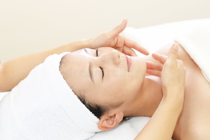 Beautiful Woman Enjoying A Massage In A Spa Center Stock Image Image Of Esthetic Healing
