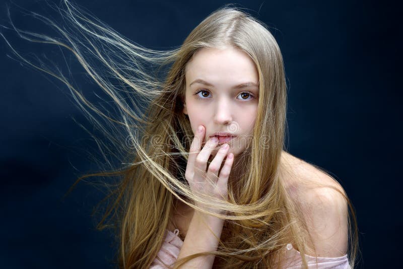 Beautiful woman with flying long hair. stock photos Beautiful woman with flying long hair. stock photos