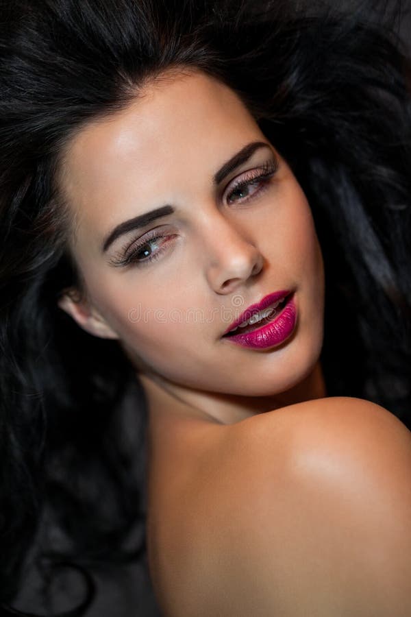 Beautiful woman with a gentle serene expression royalty free stock photo Beautiful woman with a gentle serene expression royalty free stock photo