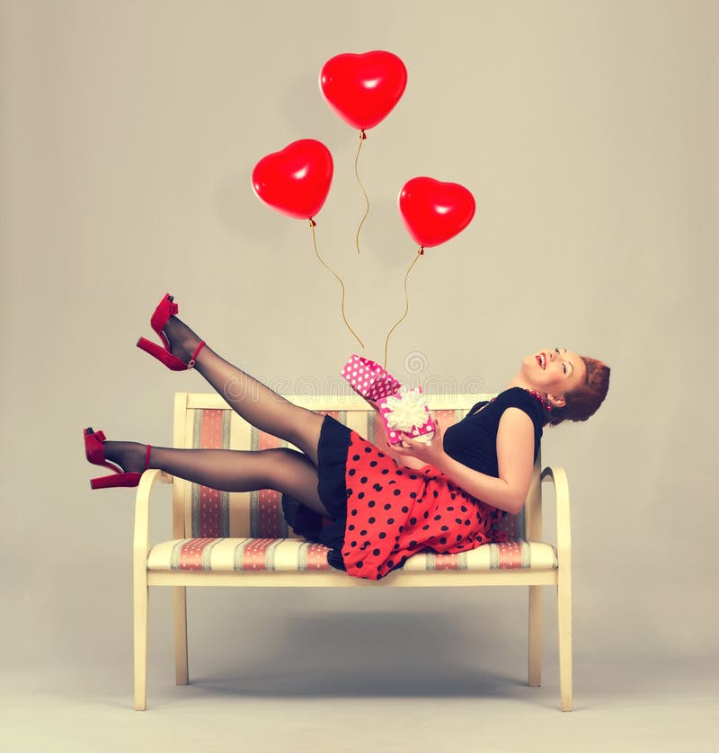 Beautiful woman with gift box