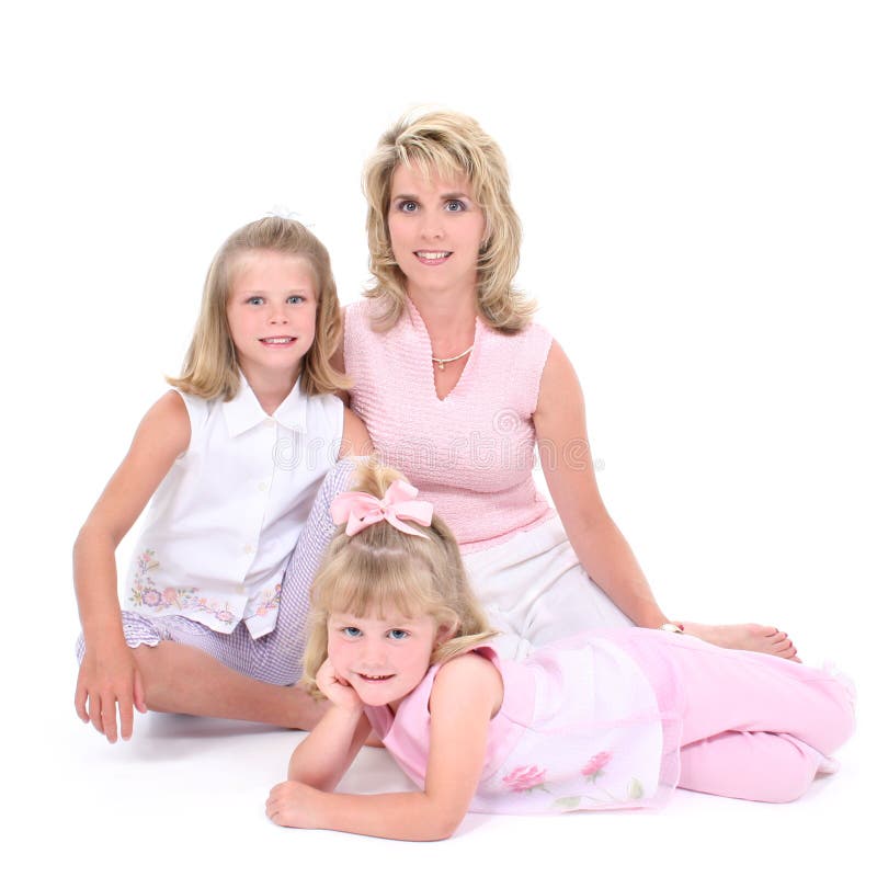 Beautiful Woman With Her Daughters Over White